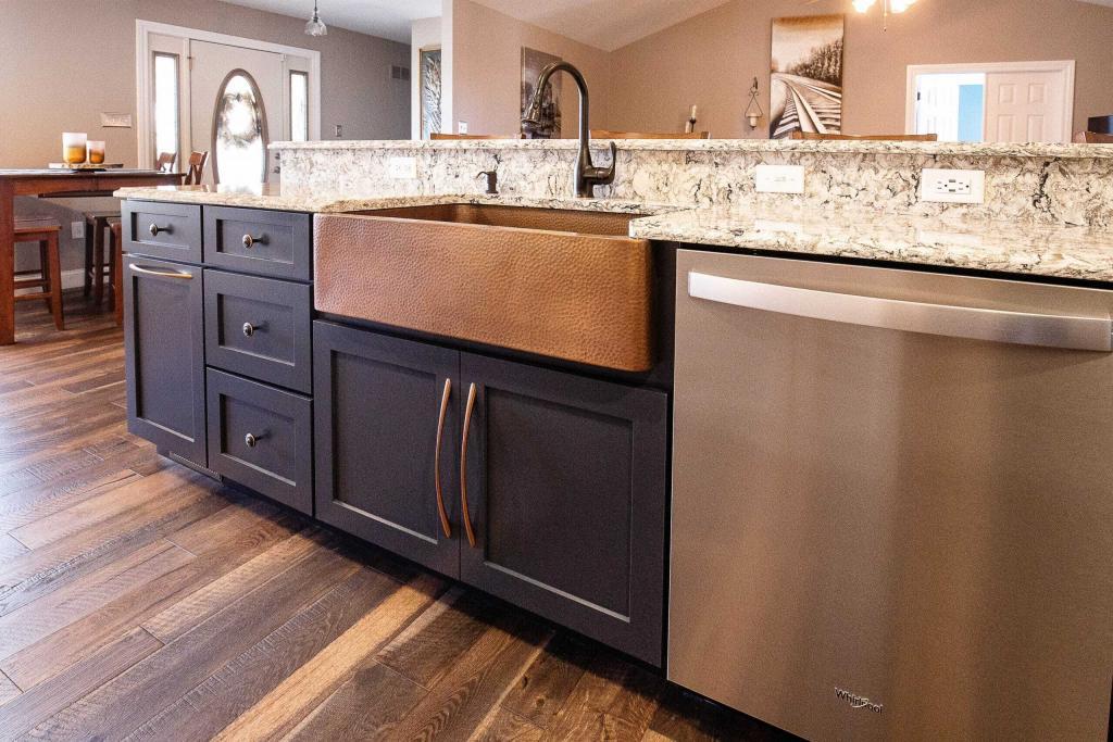dark kitchen cabinets with copper sink