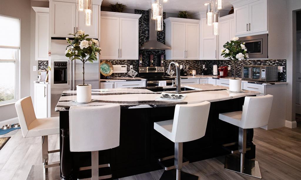 kitchen with white cabinets and black and white granite