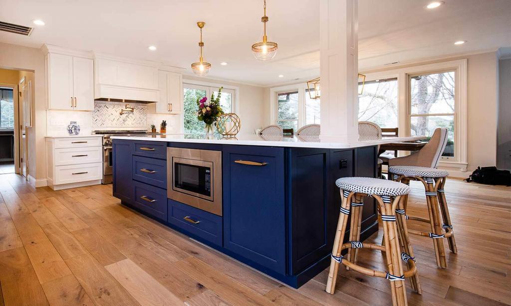 blue modern wood cabinets with white counters