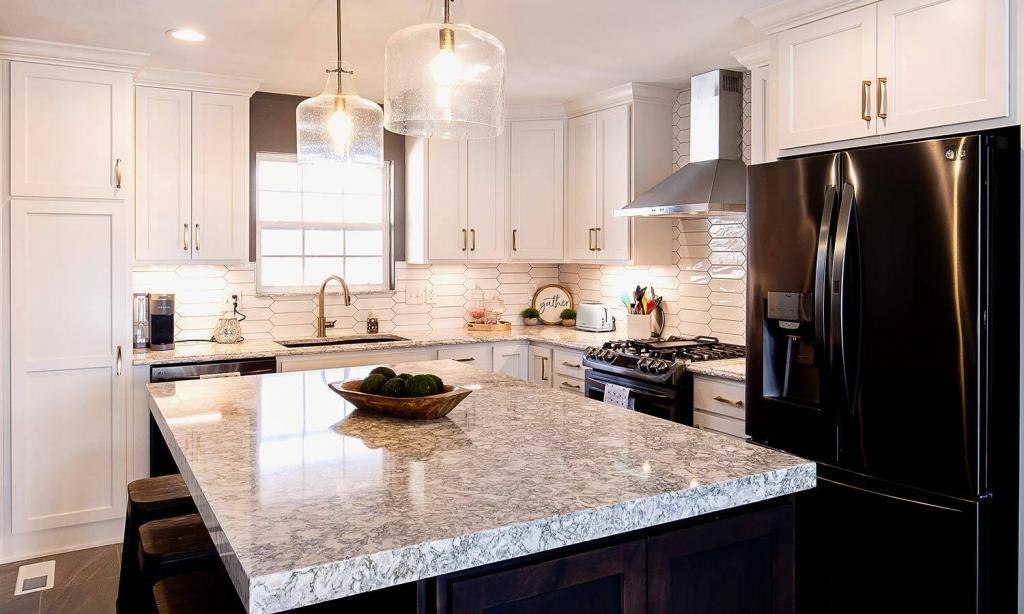 quartz counters with black and white cabinets