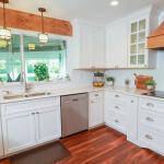 Kitchen with modern white cabinets and tile backsplash