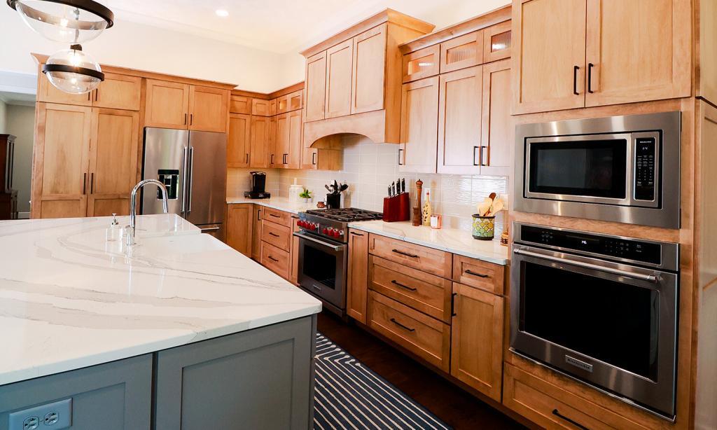 modern kitchen with green cabinets