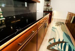 Black quartz counter for a basement bar area in Waterloo, IL.