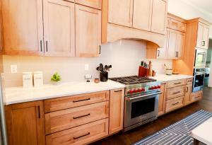Beautiful kitchen remodel in Waterloo, IL. High quality white&nbsp; quarts counters and oak perimeter custom Koch Cabinets.