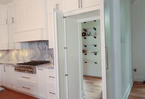 Beautiful built in Butler's Pantry in Columbia, IL. High quality quarts and white custom Koch Cabinets.